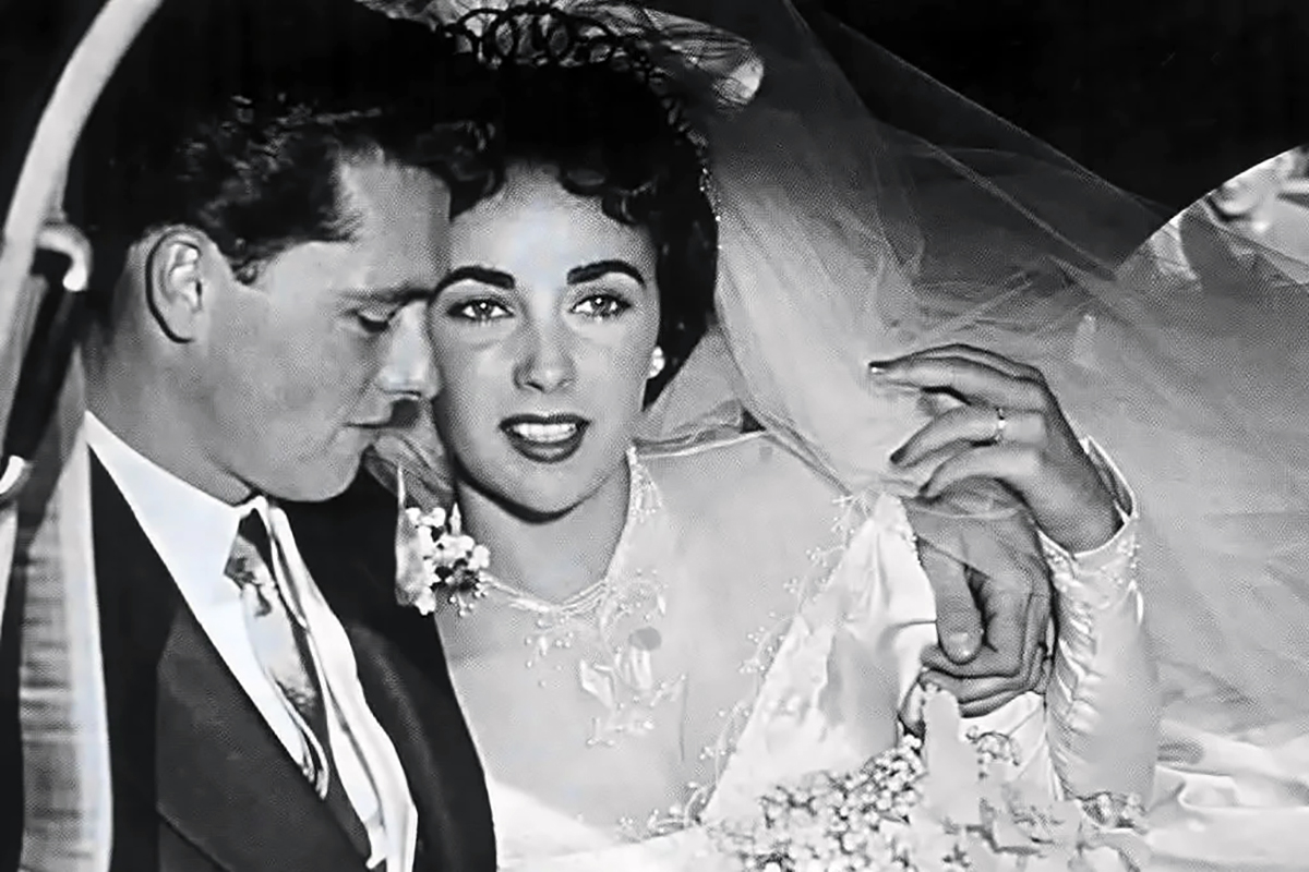 Conrad “Nikki” Hilton presented Elizabeth Taylor with a 5 carat diamond engagement ring