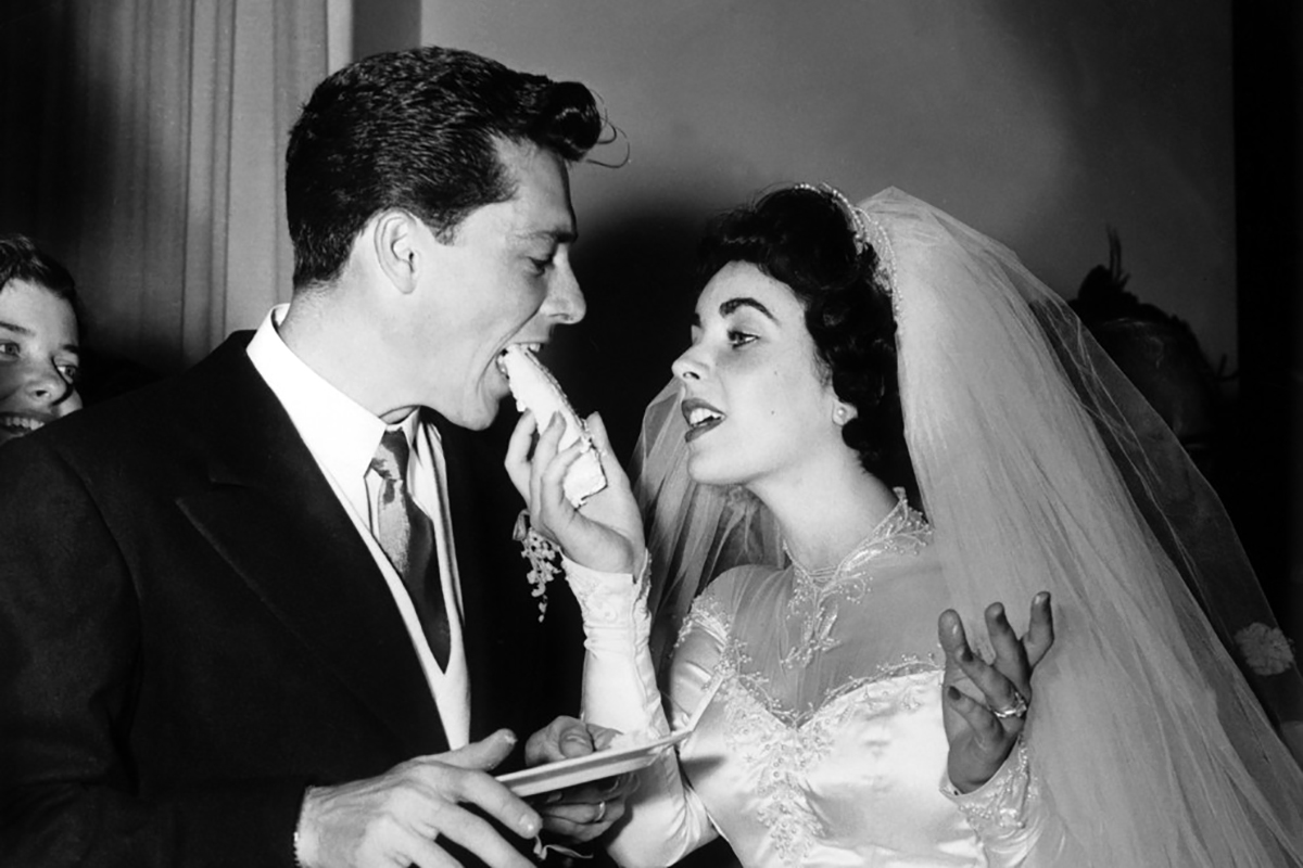 Elizabeth Taylor wore a dress designed by Helen Rose to marry Conrad “Nikki” Hilton