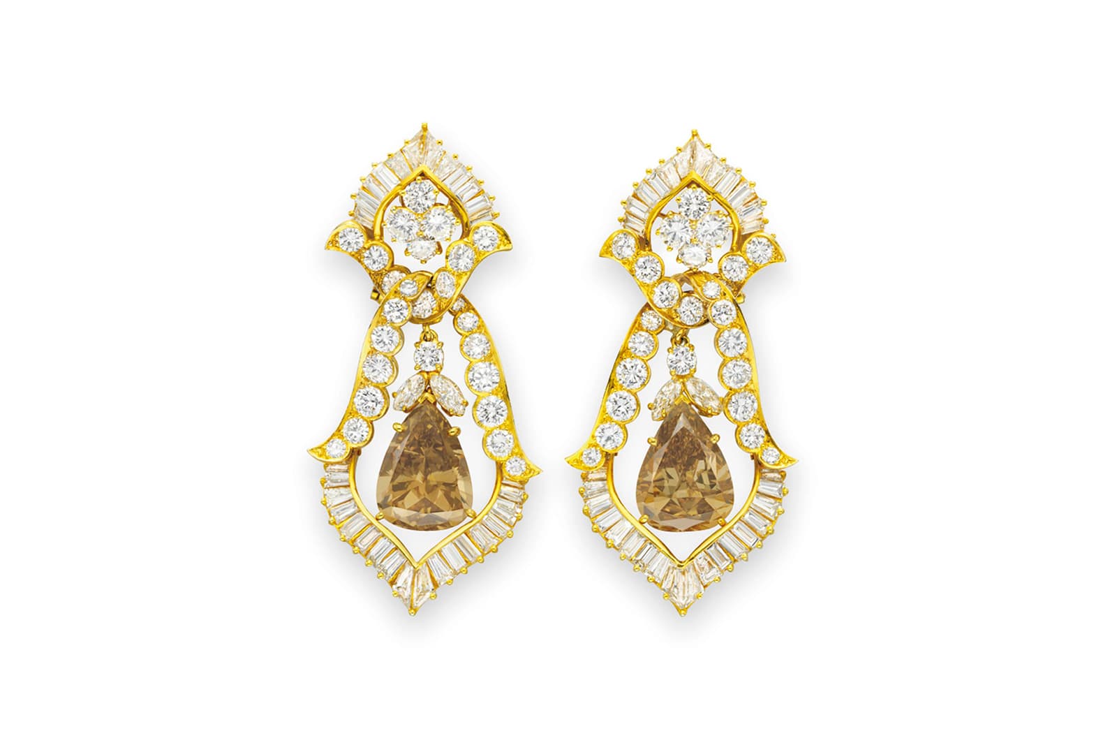 The Burton cognac diamond ear pendants by Van Cleef & Arpels were gifted to Elizabeth Taylor in 1974