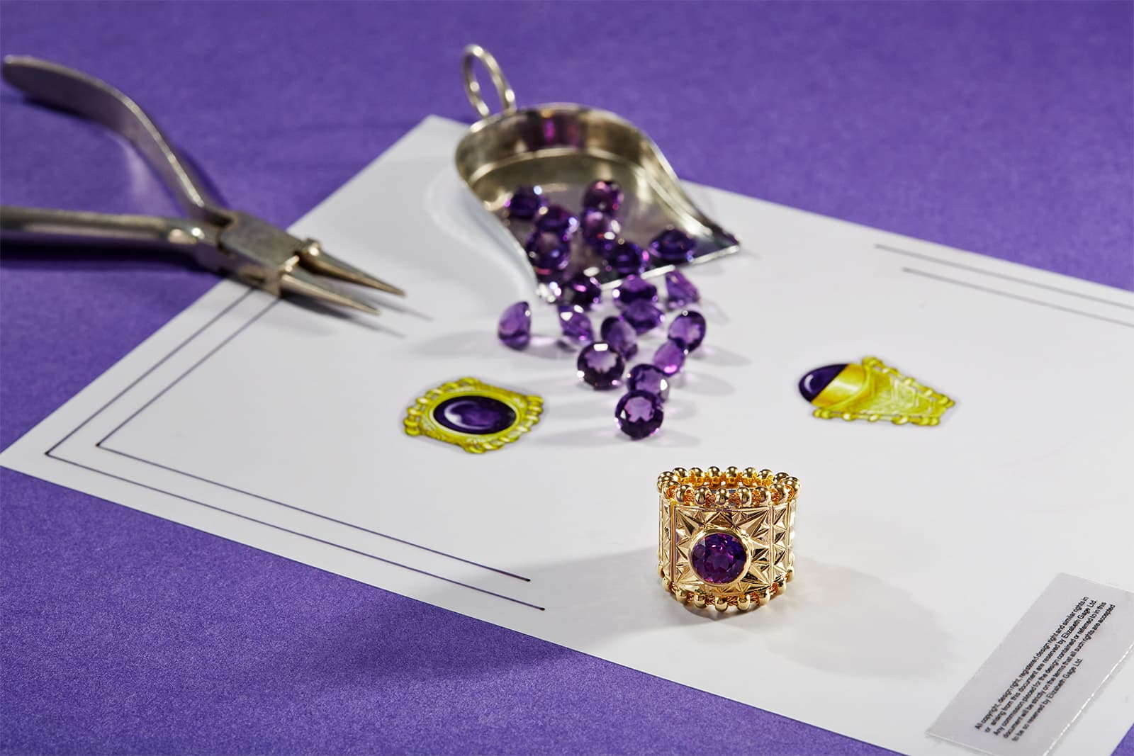   Elizabeth Gage Amethyst Agincourt with a 2.56 carat amethyst, triangular carved gold sections and a foxtail chain set in 18k yellow gold