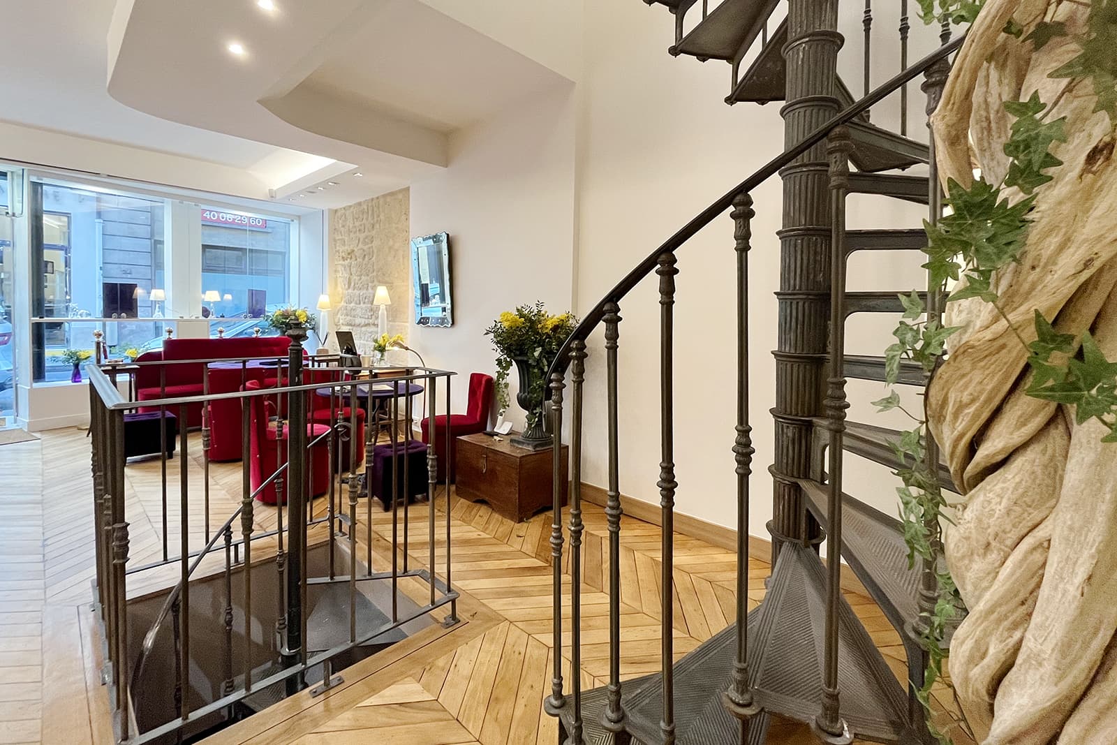 A spiral staircase captures attention at the Isabelle Langlois boutique in Paris