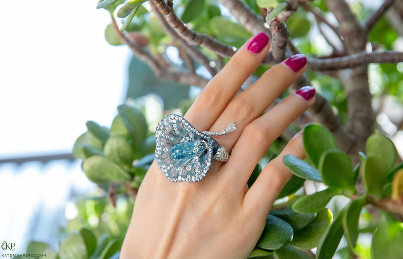 Contemporary Italian titanium flower ring set with a 16 carat aquamarine and 7 carats of diamonds, available at Galerie Montaigne