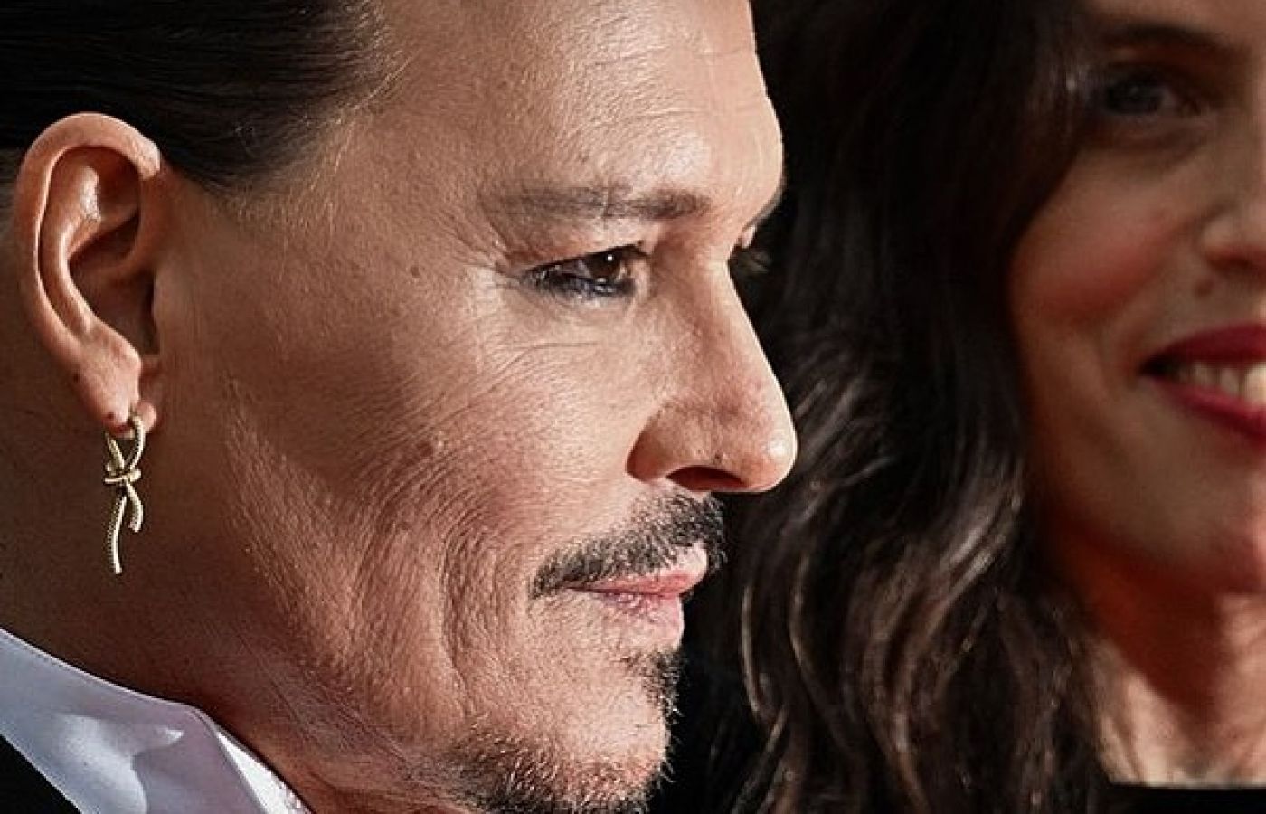 Johnny Depp in a single Sailor's Knot earring by Emmanuel Tarpin