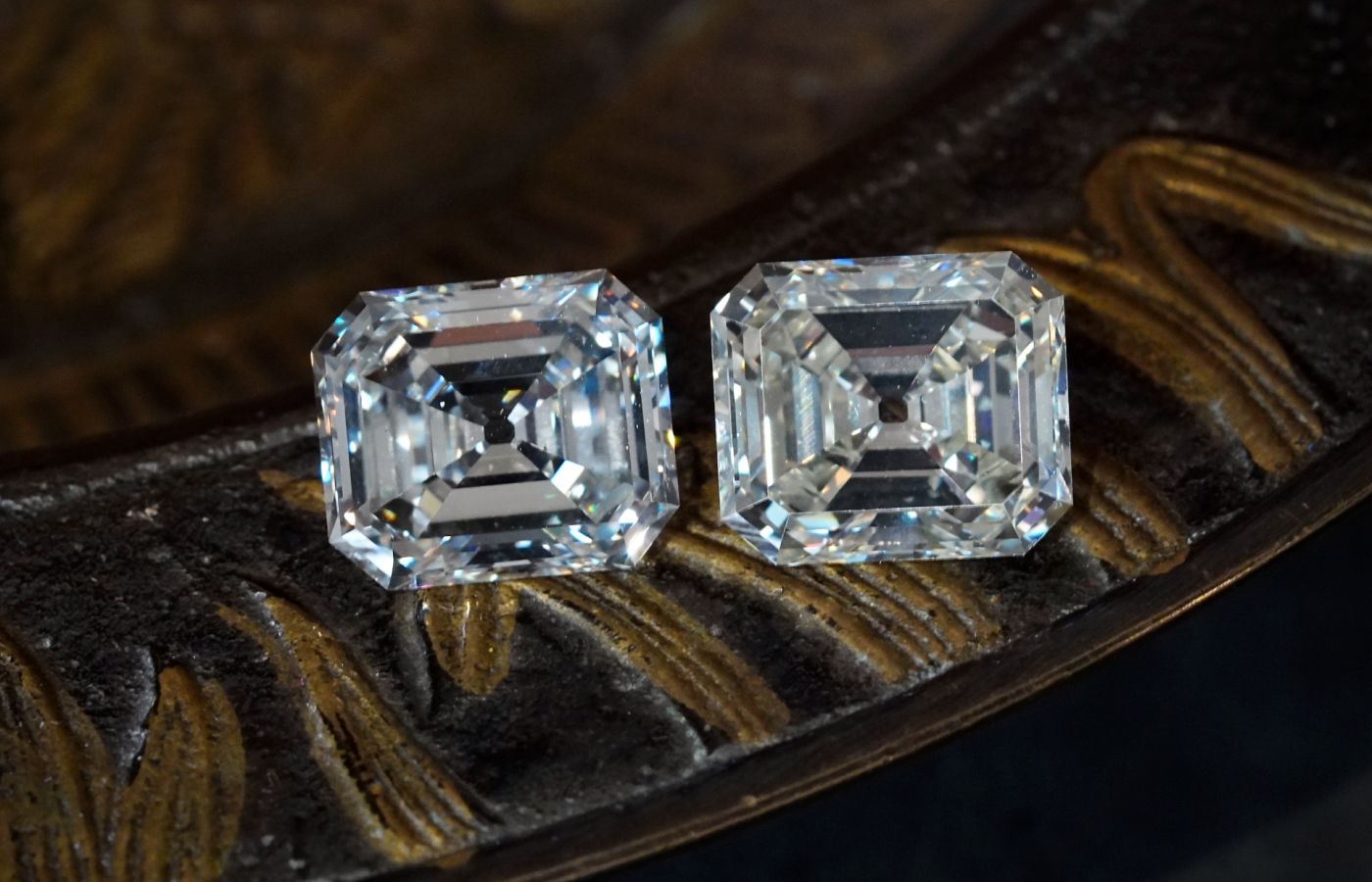  A pair of step-cut diamonds of 7.03 carats and 7.70 carats, available at the Jogani Gallery