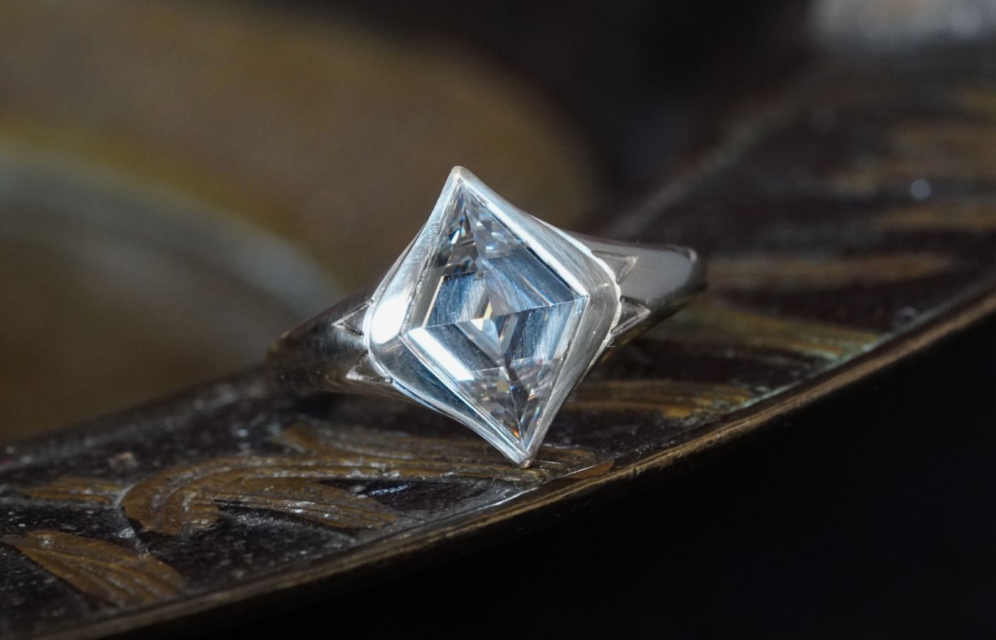  Jogani ring with a 2.12 carat lozenge-shaped step-cut diamond in a Renaissance revival-inspired 18k white gold setting 