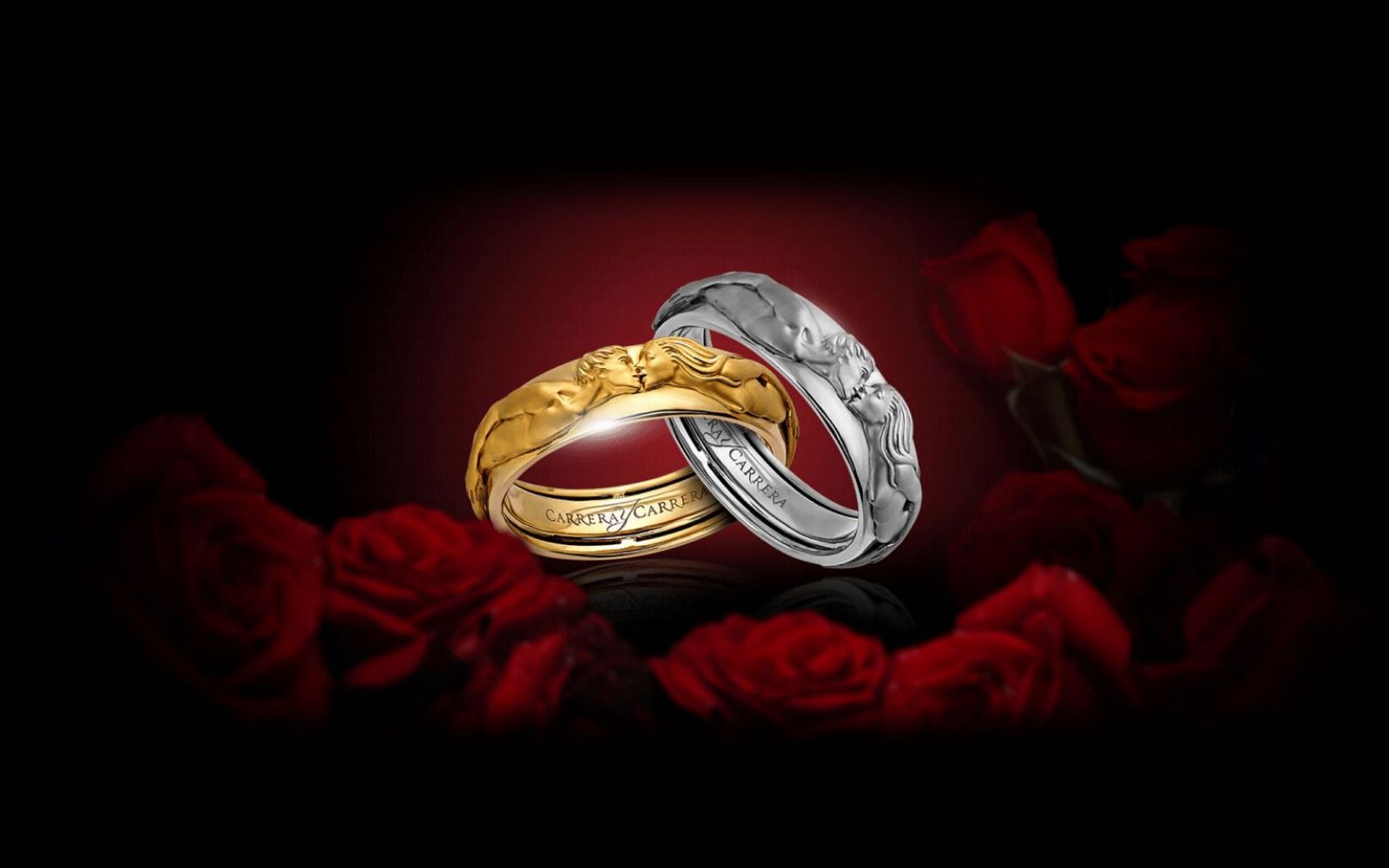 Carrera y Carrera The Kiss rings in 18k yellow and white gold from the Infinito collection