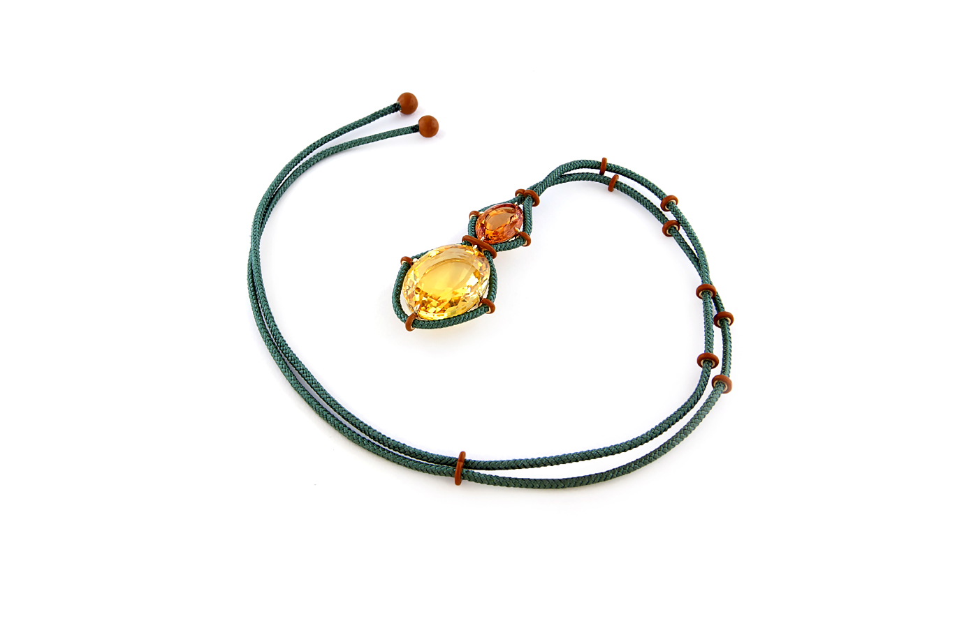 Taffin necklace in gold, ceraminc, featuring a 129.08-ct yellow sapphire and a 21.98-ct topaz